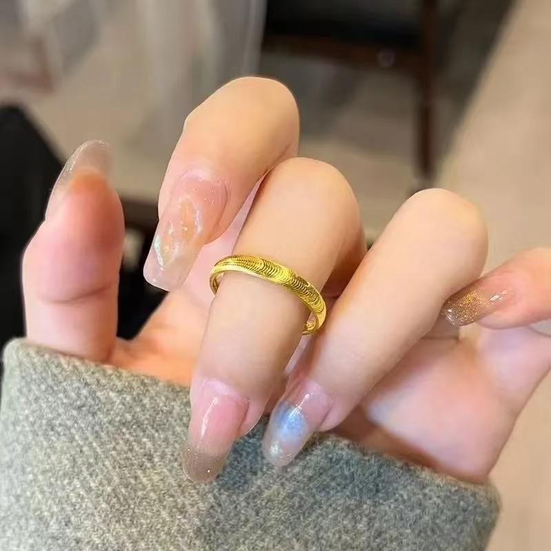简约极简主义猫眼戒指 金色波浪设计 不褪色钛钢材质 情侣对戒一对 轻奢饰品款 女士男士通用
