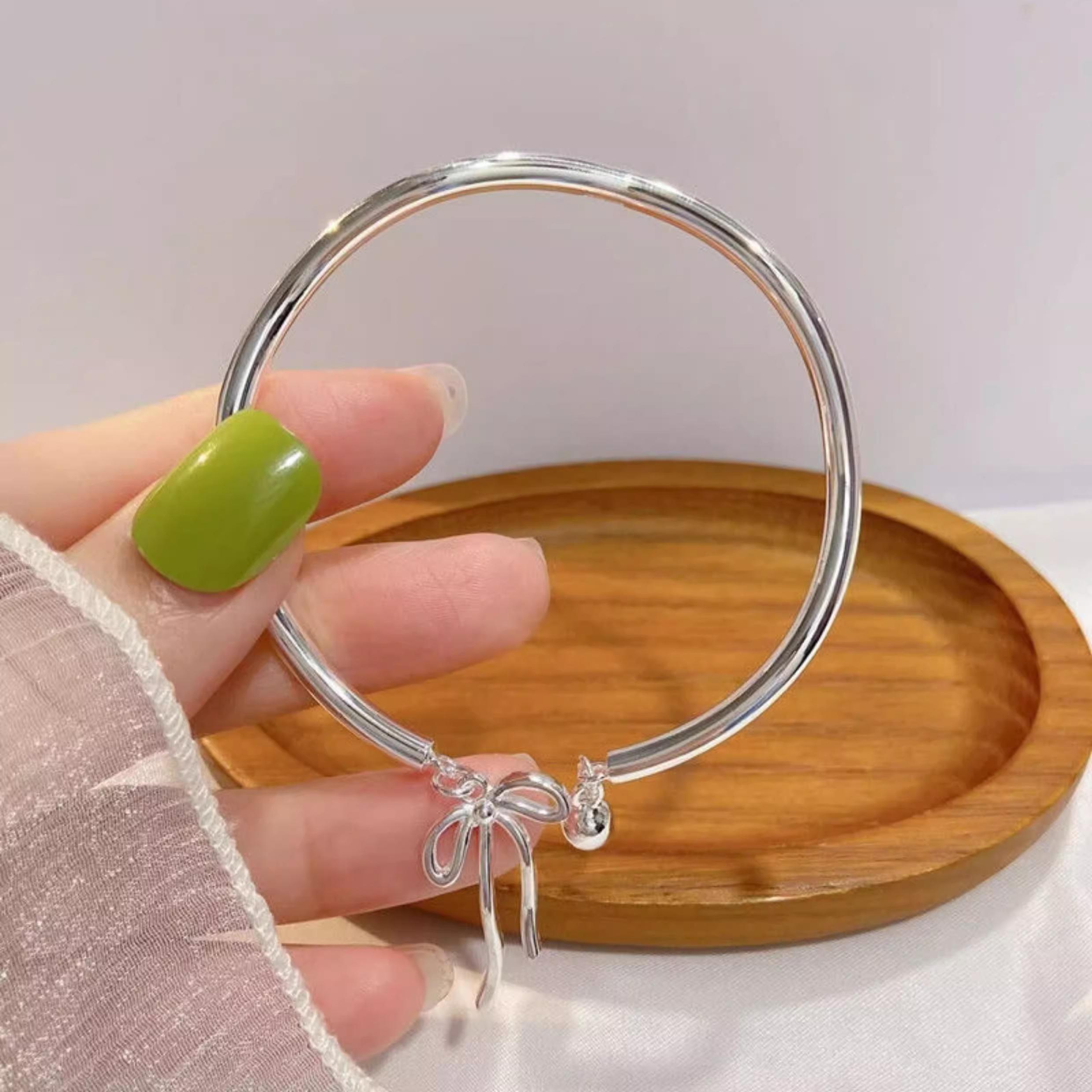 Girls' Feminine & Stylish Bracelet with Bow and Bell Beads - Unique Design